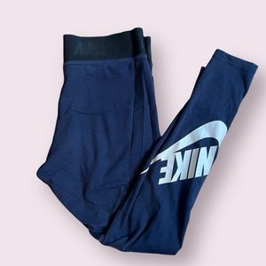 NIKE WOMEN’S NAVY LEGGINGS WITH BLACK WAISTBAND AND NIKE LOGO ON LEG